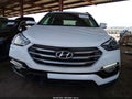 2018 Hyundai Santa Fe — photo 13 of 17 | VIN 5XYZU3LB8JG542579