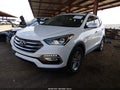 2018 Hyundai Santa Fe — photo 2 of 17 | VIN 5XYZU3LB8JG542579