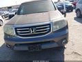 2014 Honda Pilot — photo 12 of 16 | VIN 5FNYF3H53EB011117