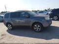 2014 Honda Pilot — photo 13 of 16 | VIN 5FNYF3H53EB011117