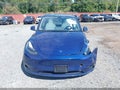 2023 Tesla Model Y — photo 12 of 19 | VIN 7SAYGAEE6PF829842
