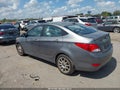 2014 Hyundai Accent — photo 14 of 16 | VIN KMHCU4AEXEU771838