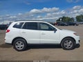 2010 Hyundai Santa Fe — photo 13 of 16 | VIN 5NMSGDABXAH349289