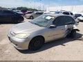 2004 Honda Civic — photo 2 of 15 | VIN 2HGES16514H590236