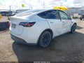 2021 Tesla Model Y — photo 4 of 18 | VIN 5YJYGAEE3MF198413