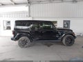 2021 Jeep Wrangler — photo 13 of 16 | VIN 1C4JJXP68MW658463