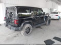 2021 Jeep Wrangler — photo 4 of 16 | VIN 1C4JJXP68MW658463