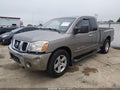 2006 Nissan Titan — photo 2 of 11 | VIN 1N6BA06BX6N554900
