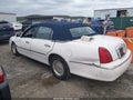 1998 Lincoln Town Car — photo 14 of 16 | VIN 1LNFM81W8WY657036