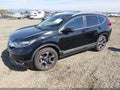 2018 Honda CR-V — photo 2 of 21 | VIN 2HKRW2H94JH639135
