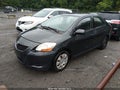 2009 Toyota Yaris — photo 2 of 11 | VIN JTDBT903594060389