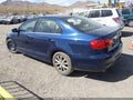 2014 Volkswagen Jetta — photo 3 of 11 | VIN 3VWD17AJXEM321849