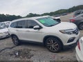 2016 Honda Pilot — photo 13 of 16 | VIN 5FNYF6H09GB053039