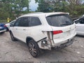 2016 Honda Pilot — photo 14 of 16 | VIN 5FNYF6H09GB053039
