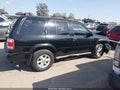 2000 Nissan Pathfinder — photo 13 of 16 | VIN JN8AR07S1YW422017