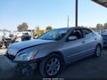 2003 Honda Accord — photo 14 of 16 | VIN 1HGCM66513A071814
