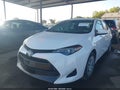 2019 Toyota Corolla — photo 2 of 16 | VIN 5YFBURHE0KP860846