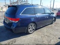 2014 Honda Odyssey — photo 4 of 17 | VIN 5FNRL5H99EB001008