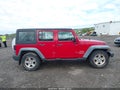 2011 Jeep Wrangler Unlimited — photo 13 of 16 | VIN 1J4BZ3H19BL602646