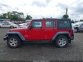 2011 Jeep Wrangler Unlimited — photo 14 of 16 | VIN 1J4BZ3H19BL602646