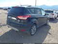 2014 Ford Escape — photo 4 of 16 | VIN 1FMCU9GX1EUD54064