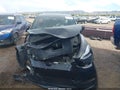 2025 Tesla Model Y — photo 12 of 16 | VIN 7SAYGDEF1SA348431