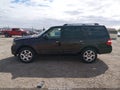 2013 Ford Expedition — photo 14 of 16 | VIN 1FMJU2A54DEF28725