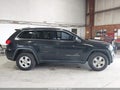 2014 Jeep Grand Cherokee — photo 13 of 19 | VIN 1C4RJFAG2EC214139