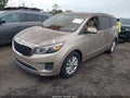 2016 Kia Sedona — photo 2 of 11 | VIN KNDMB5C1XG6151867