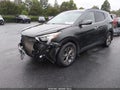 2014 Hyundai Santa Fe — photo 2 of 17 | VIN 5XYZU3LB4EG162984