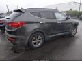 2014 Hyundai Santa Fe — photo 4 of 17 | VIN 5XYZU3LB4EG162984