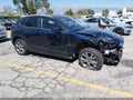 2024 Mazda CX-30 — photo 13 of 19 | VIN 3MVDMBCM8RM664510