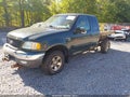 2002 Ford F-150 — photo 2 of 11 | VIN 1FTRX18W12NA21138