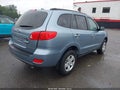 2009 Hyundai Santa Fe — photo 4 of 16 | VIN 5NMSG13DX9H329858