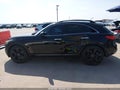 2015 Infiniti QX70 — photo 14 of 19 | VIN JN8CS1MU7FM382219
