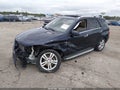 2014 Mercedes-Benz ML-Class — photo 2 of 16 | VIN 4JGDA2EB3EA436472
