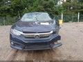 2016 Honda Civic — photo 13 of 19 | VIN 19XFC1F33GE037859