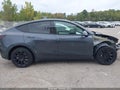2022 Tesla Model Y — photo 14 of 21 | VIN 7SAYGDEE7NF424622