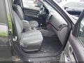 2012 Hyundai Santa Fe — photo 5 of 12 | VIN 5XYZH4AG4CG148234