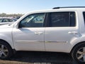 2014 Honda Pilot — photo 14 of 16 | VIN 5FNYF4H92EB007018