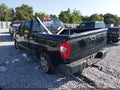 2014 Toyota Tundra — photo 3 of 16 | VIN 5TFRM5F14EX073895
