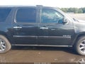 2013 GMC Yukon XL — photo 14 of 17 | VIN 1GKS2MEFXDR306135