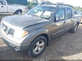 2008 Nissan Frontier — photo 6 of 17 | VIN 1N6AD09W98C436160