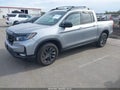 2021 Honda Ridgeline — photo 2 of 16 | VIN 5FPYK3F10MB001016
