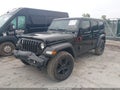 2020 Jeep Wrangler Unlimited — photo 2 of 16 | VIN 1C4HJXDG6LW313359