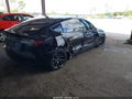 2021 Tesla Model 3 — photo 4 of 14 | VIN 5YJ3E1EA5MF045609