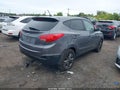 2015 Hyundai Tucson — photo 4 of 11 | VIN KM8JTCAF1FU033893