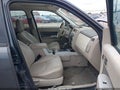 2009 Mercury Mariner — photo 5 of 16 | VIN 4M2CU91G19KJ00945