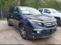 2018 Honda Pilot — photo 1 of 16 | VIN 5FNYF5H51JB019769