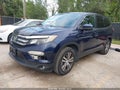 2018 Honda Pilot — photo 2 of 16 | VIN 5FNYF5H51JB019769